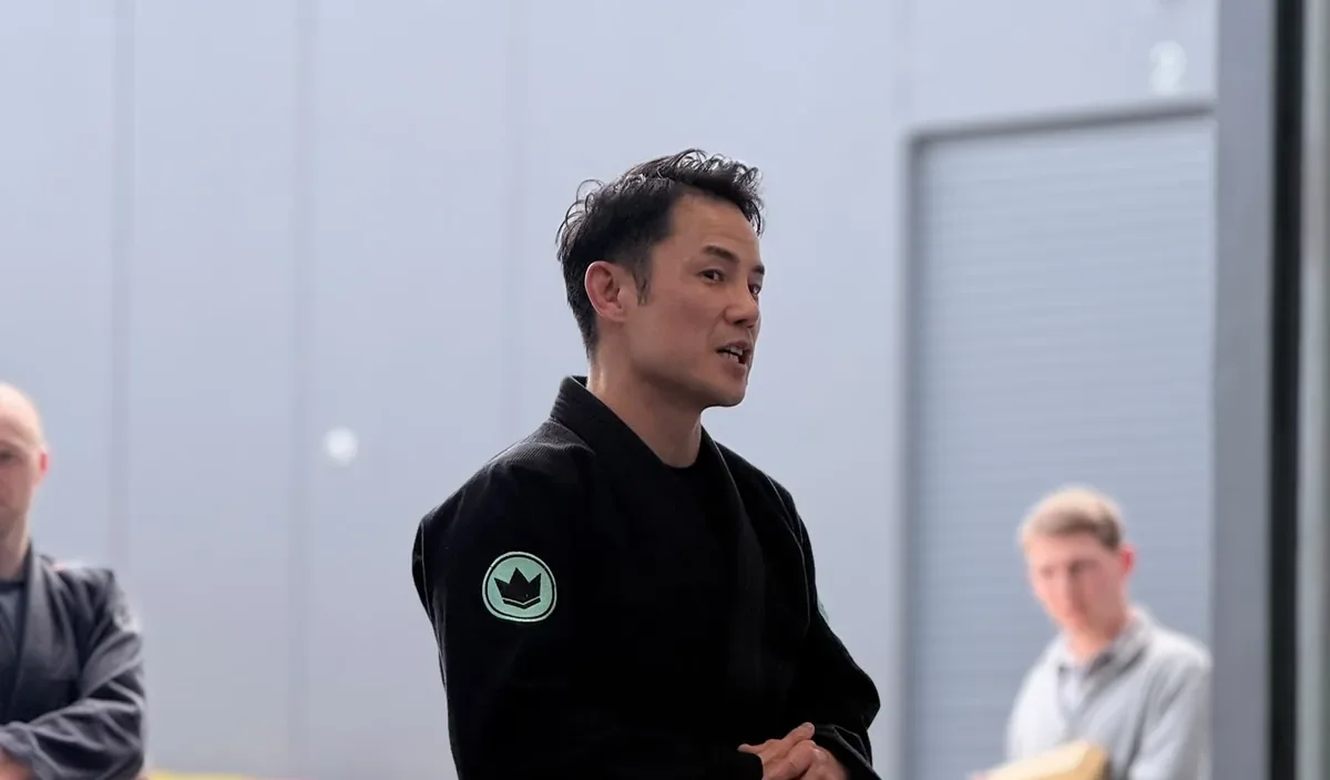 Jason Ng talking to the room on opening day at the Mitcham academy