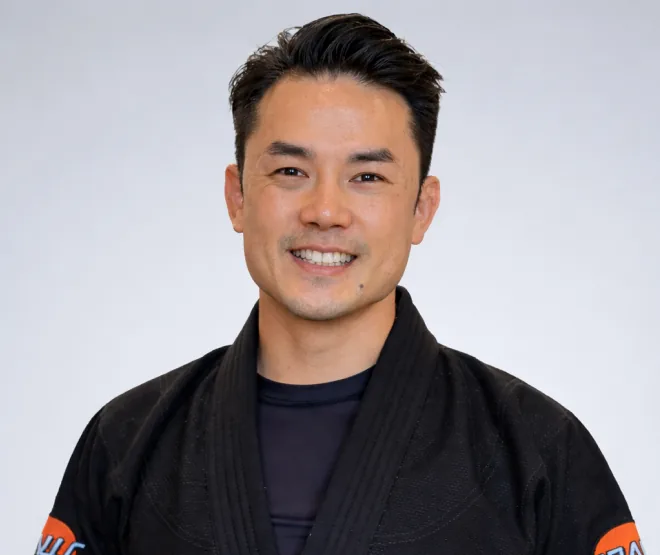 Jason Ng, Head Coach at Noble Grounds BJJ, in his black belt gi